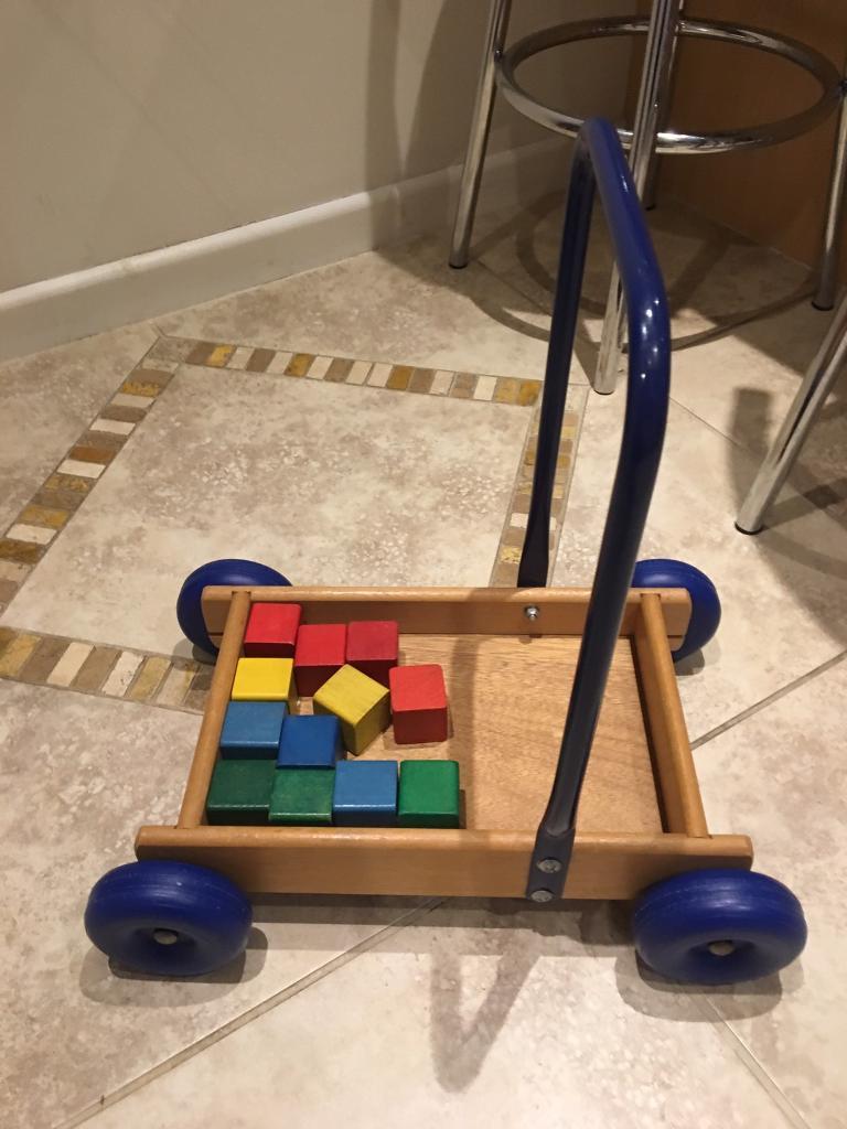 childs wooden trolley with bricks